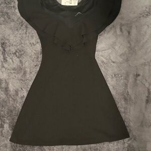 Black elegant mini dress with ruffle neckline detail - FashionNova